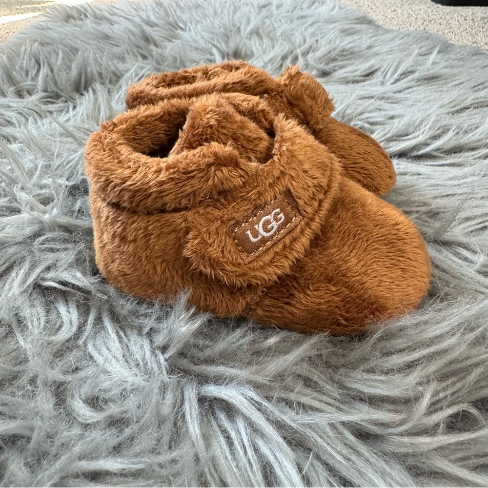 Brown fuzzy baby boot shoe